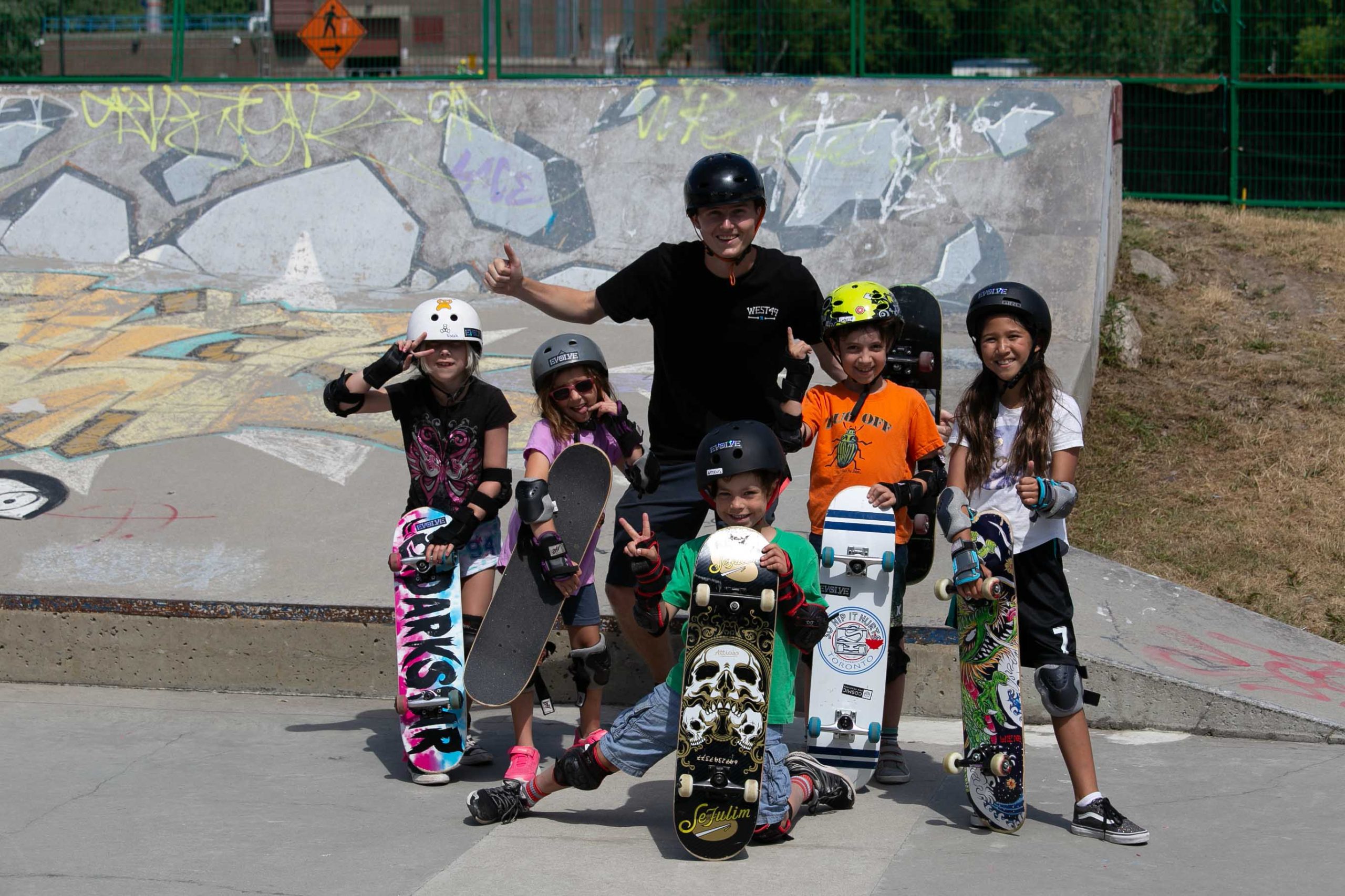 Toronto Summer Camps | Camper learning how to Skateboard | Evolve Camps